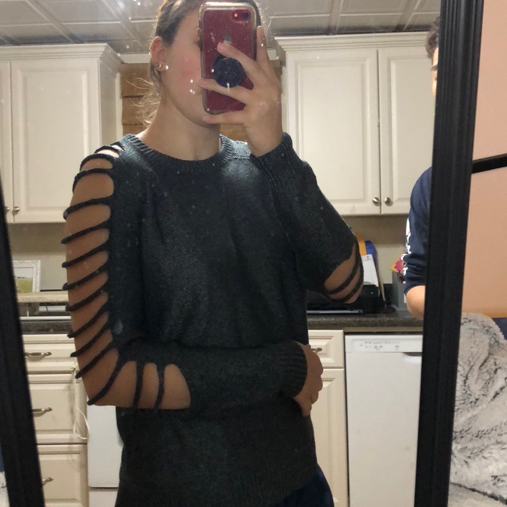 Edgy, cut-out sweater